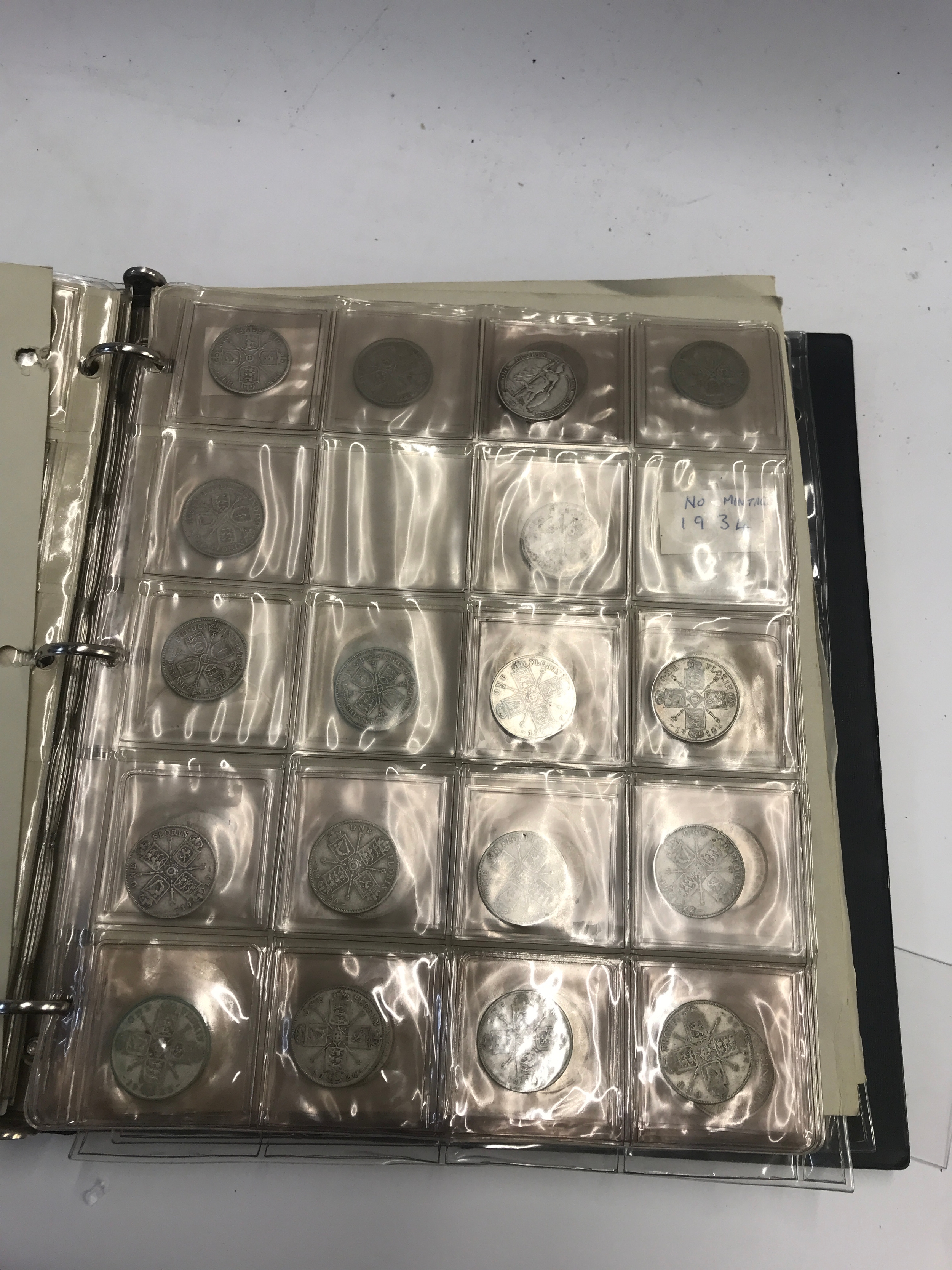 Coin album to contain lots of silver and half silver coinage and Canadian dollars.