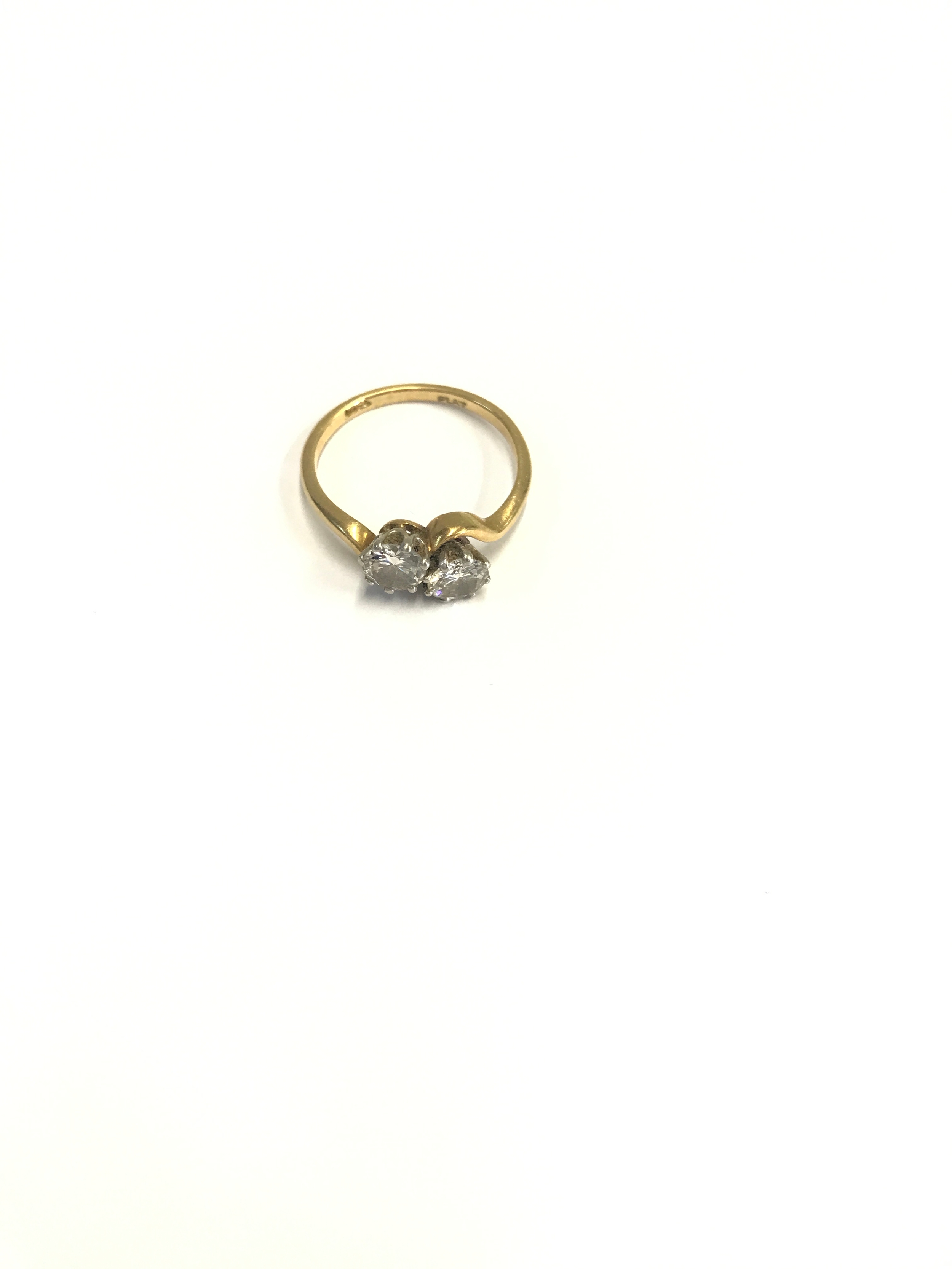 A diamond two stone crossover ring size M  2.75g