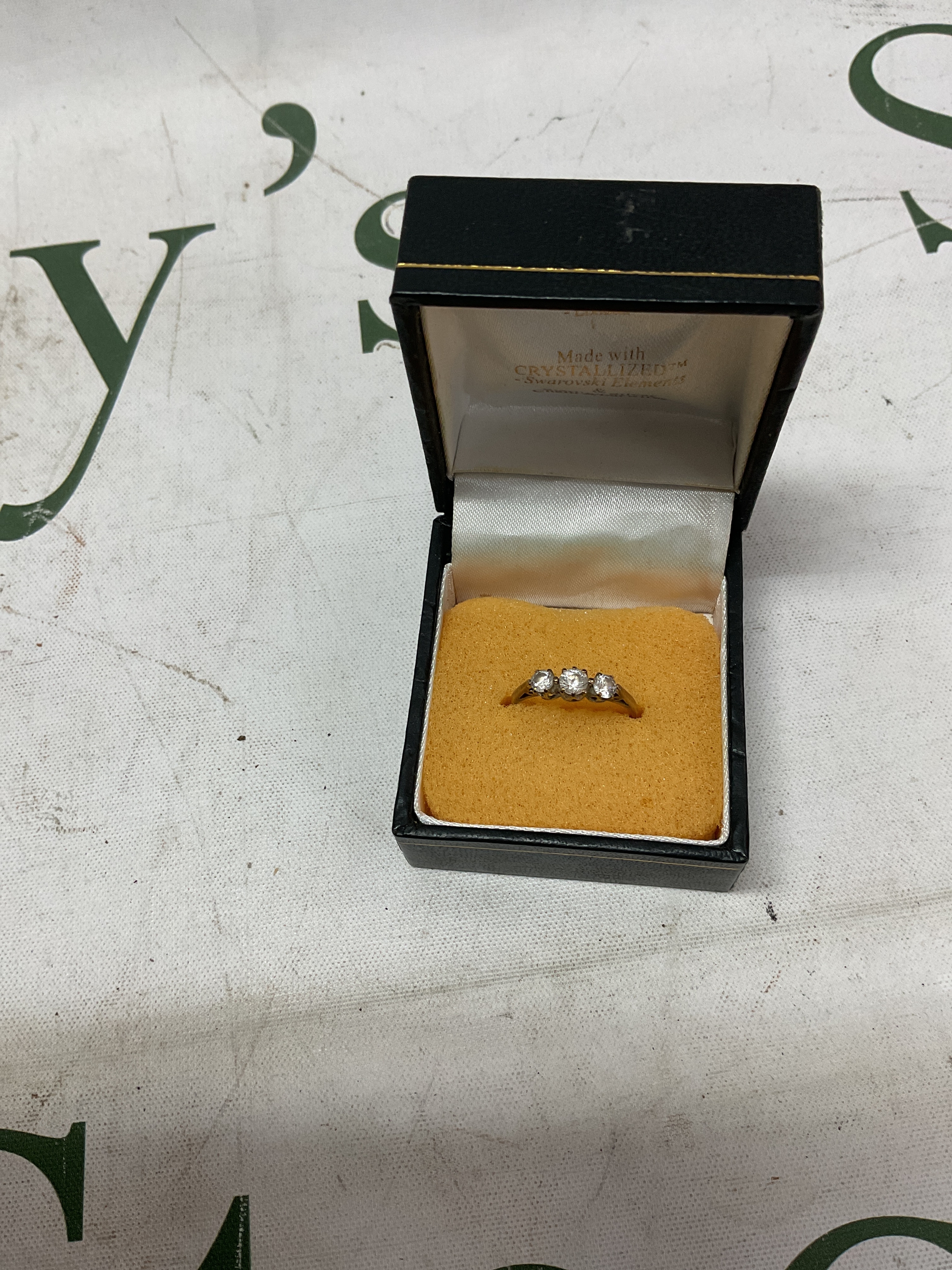 9ct CZ trilogy ring, weight 1.4 grams.