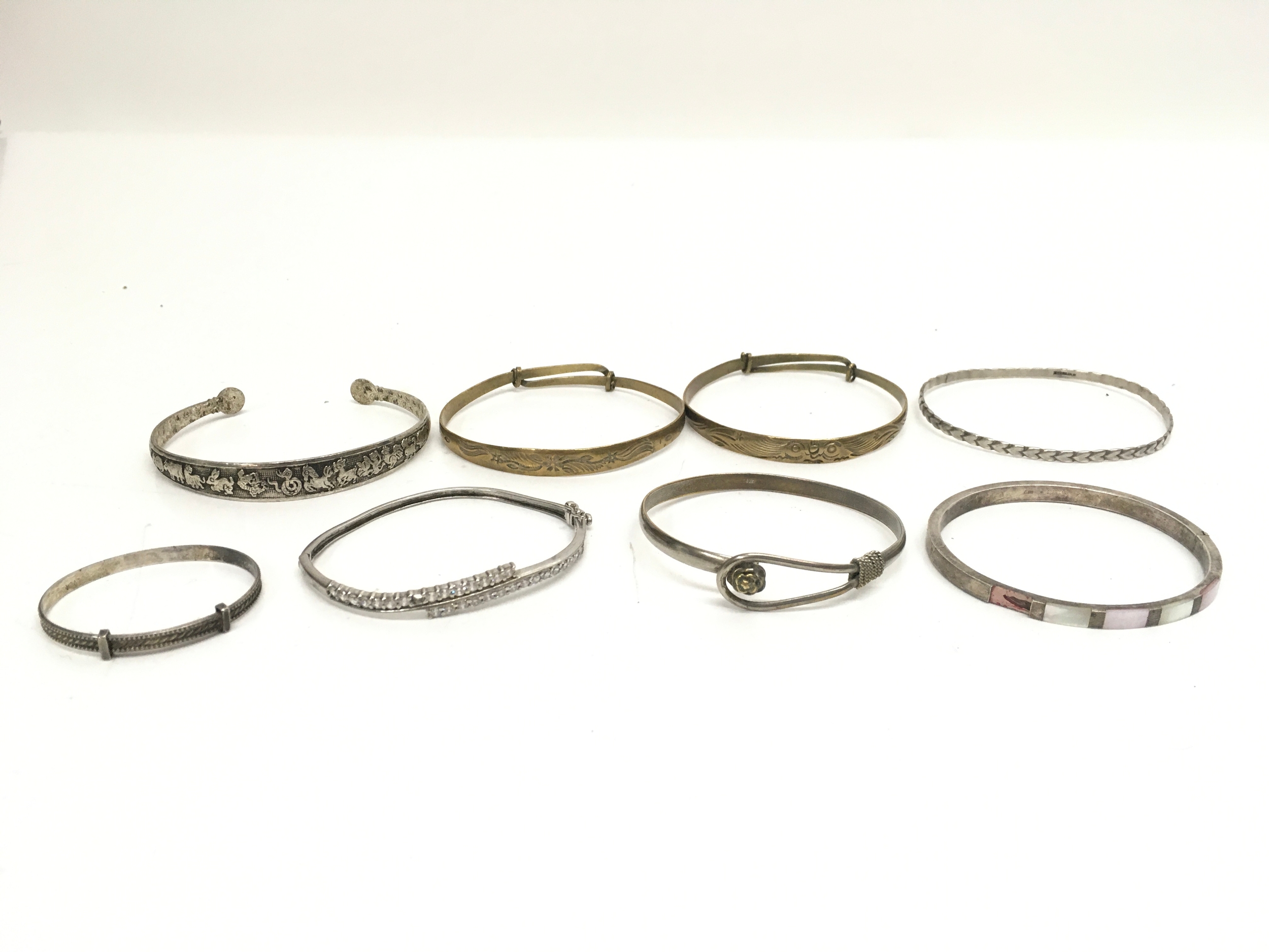 A collection of silver bracelets, 80g total weight approx