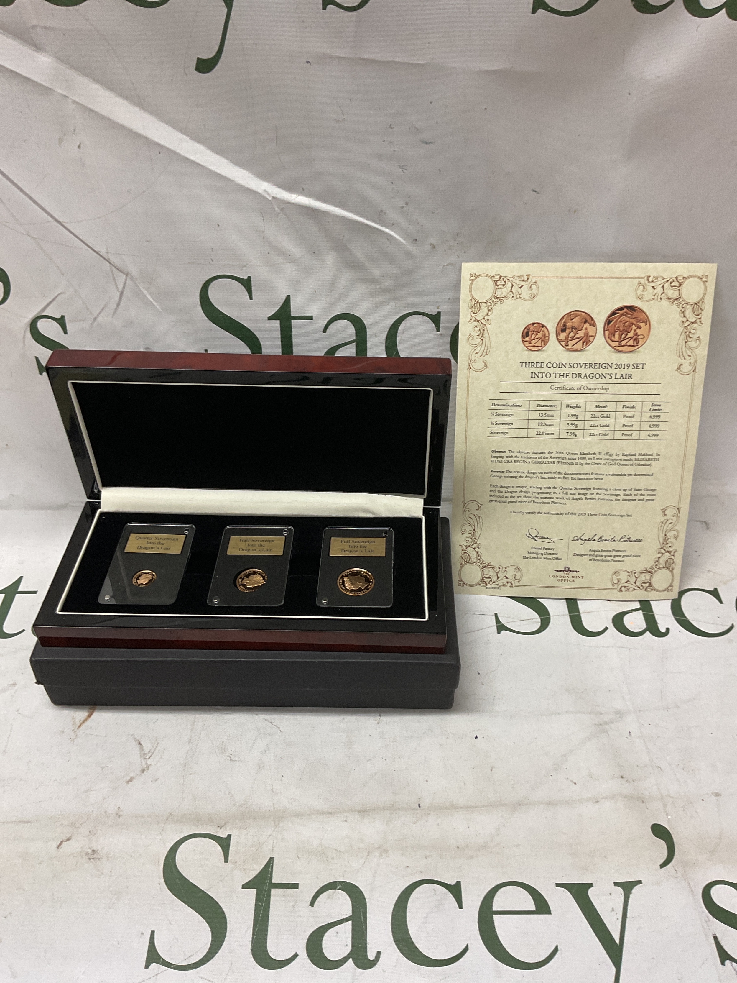 Three Coin Sovereign 2019 Set Into The Dragons Lair. Cases and complete with certificate, by London Mint, comprising full, half, and quarter sovereign, new design by great great great grandniece of Benedetto Pistrucci.