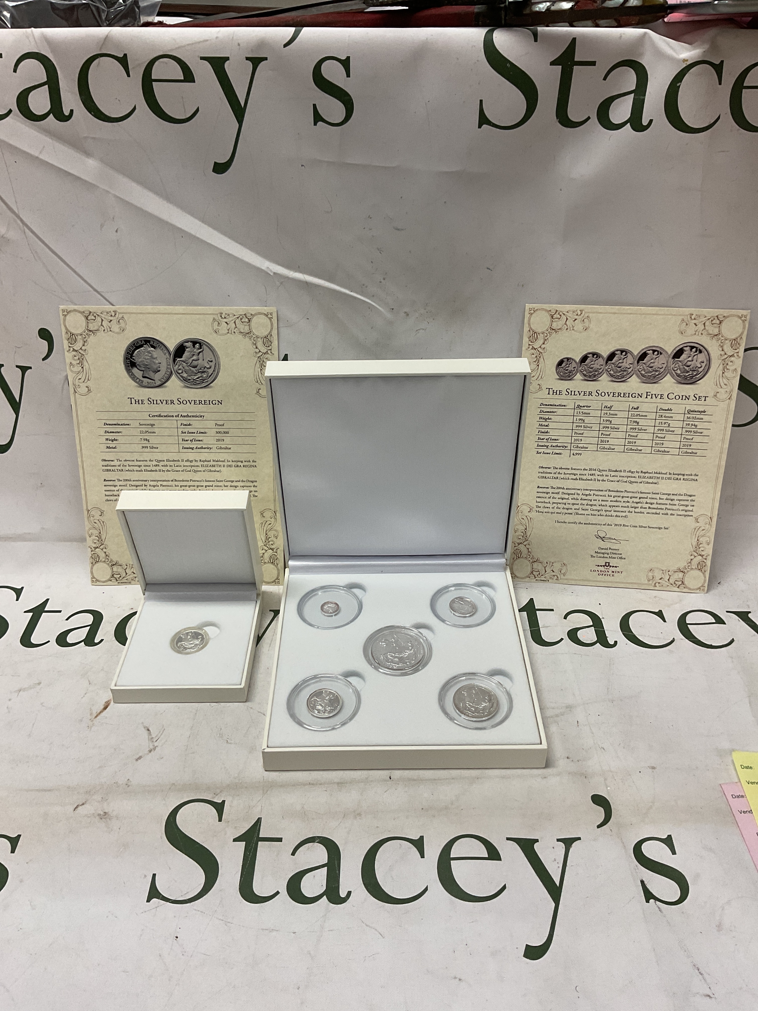 Two cases sets from London Mint of the Silver Sovereign, and the Silver Sovereign Five Coin Set. In boxes and with certificates.