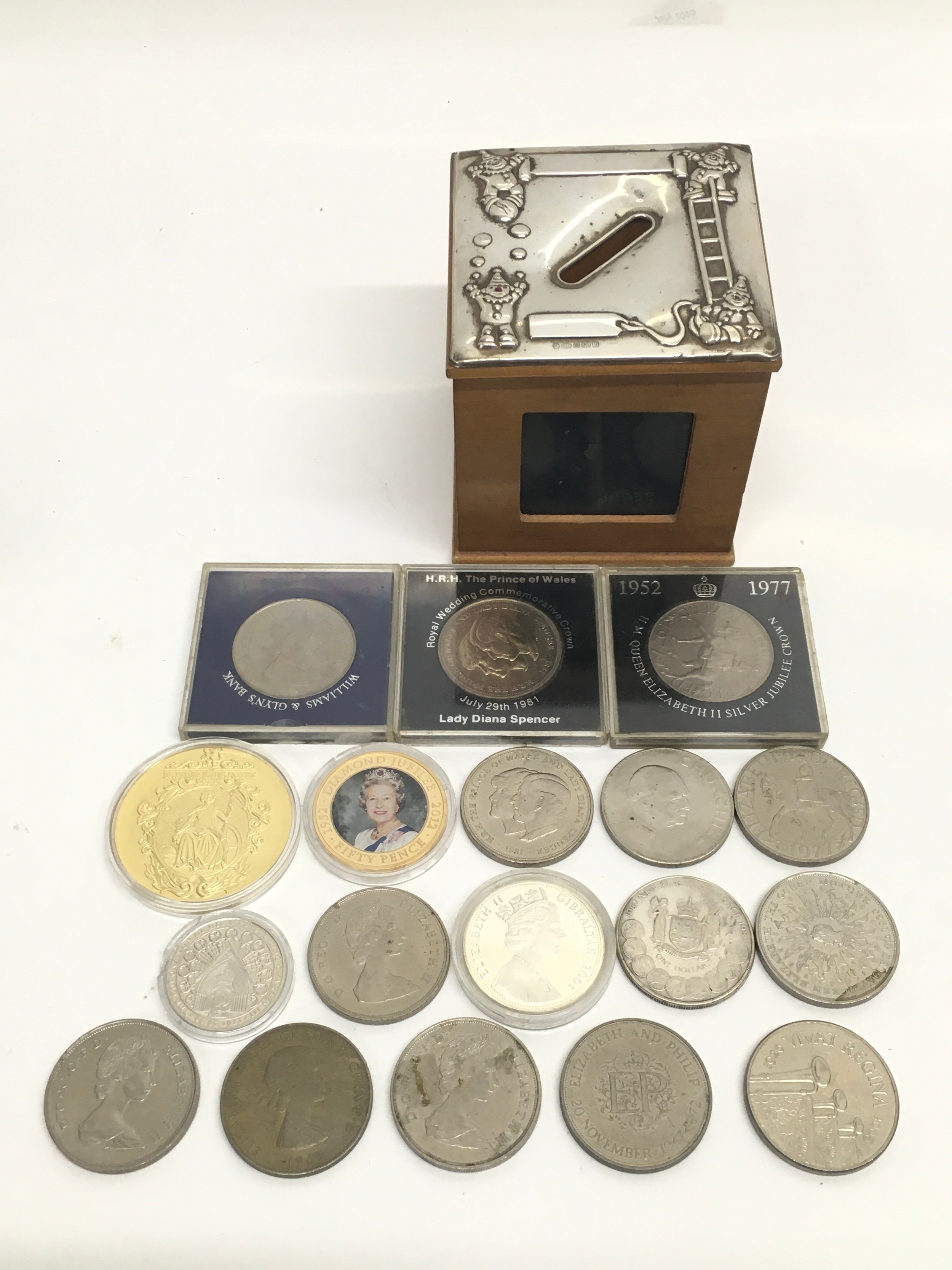 A Carrs Lustre hallmarked silver mounted money box with a collection of coins