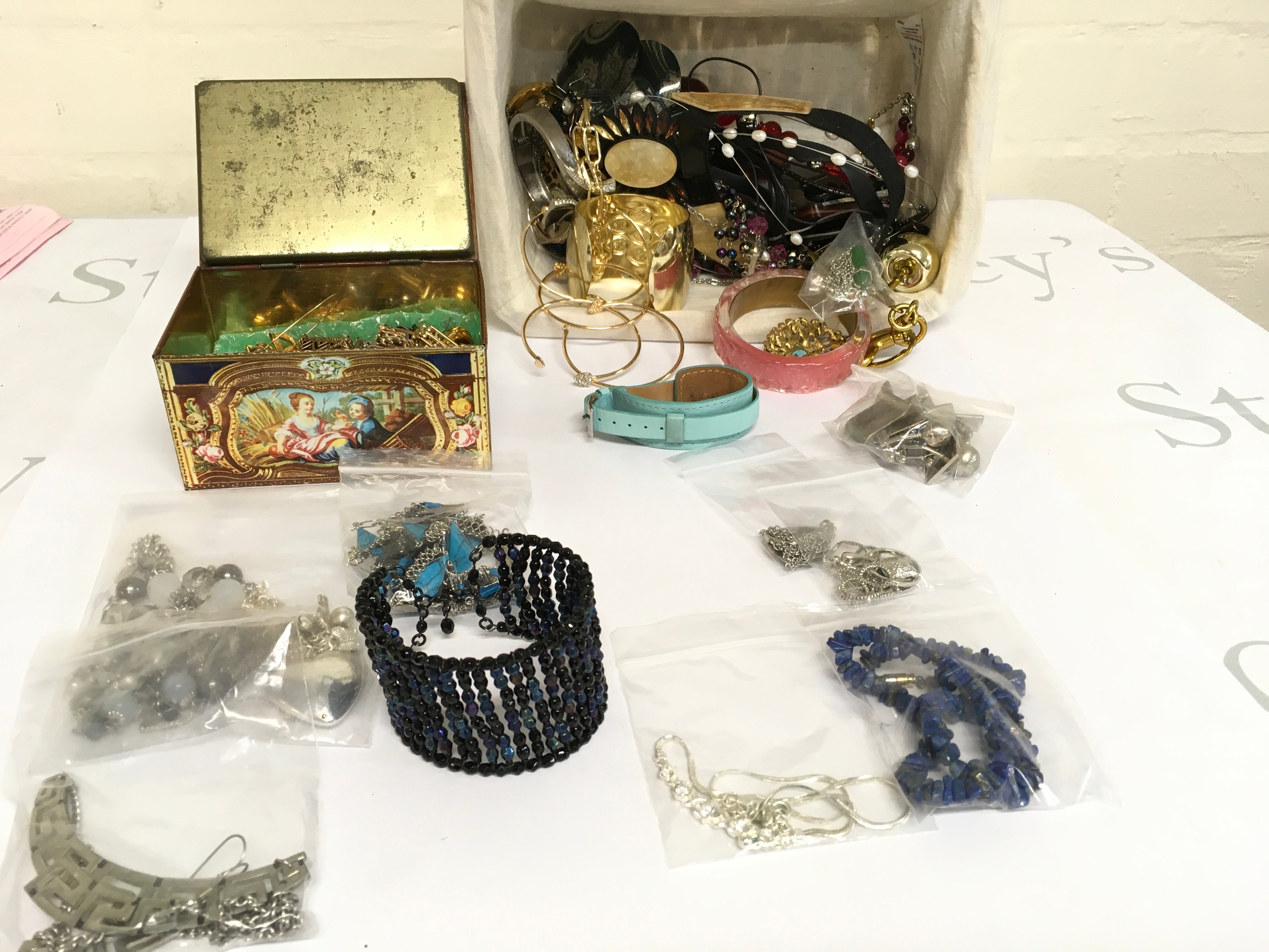 A collection of assorted costume jewellery including necklaces bracelets earrings etc.