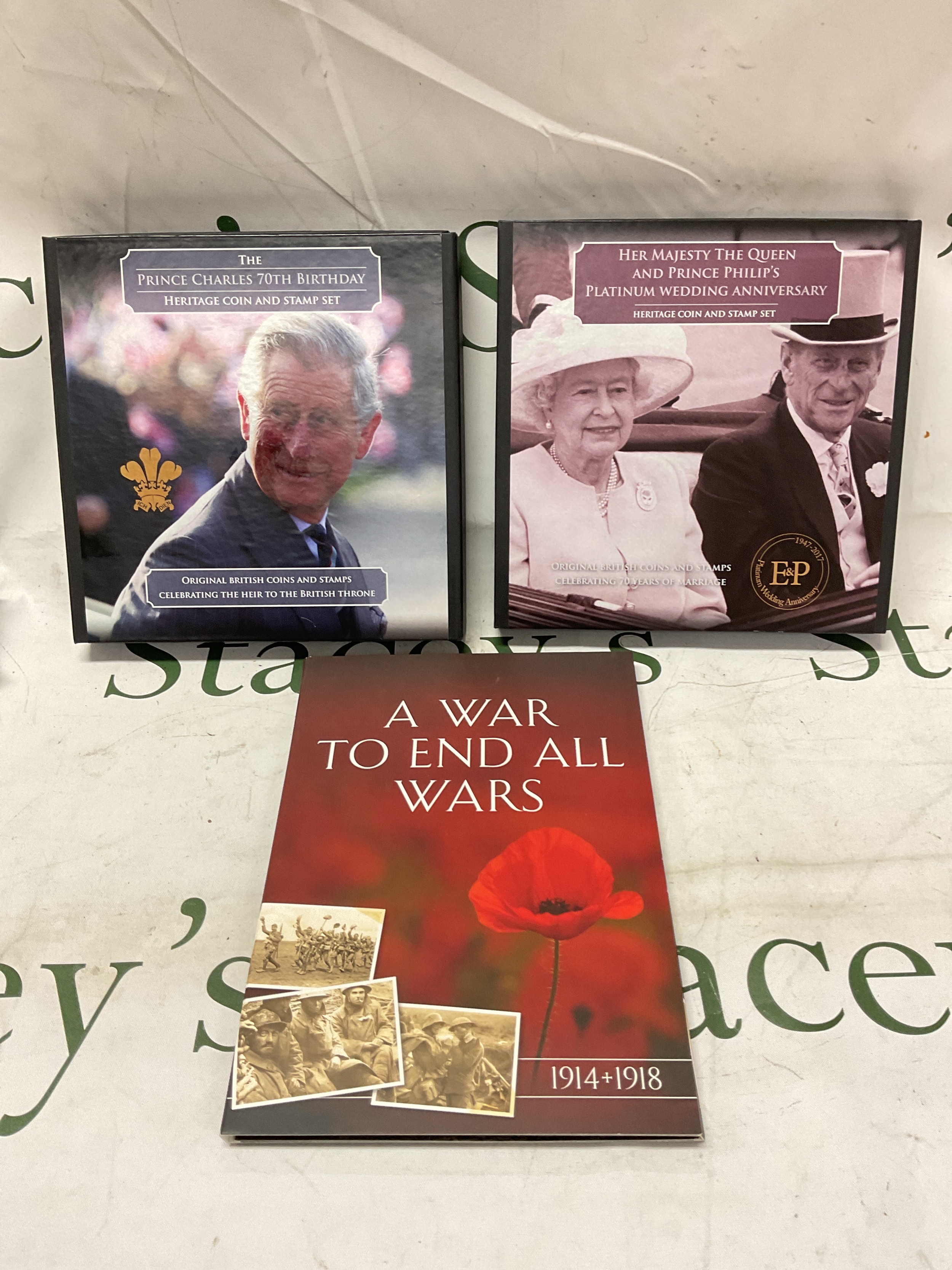 Three coin sets, Prince Charles 70th Birthday, HM the Queen and Prince Phillip's Platinum Wedding Anniversary and A War To End All Wars.
