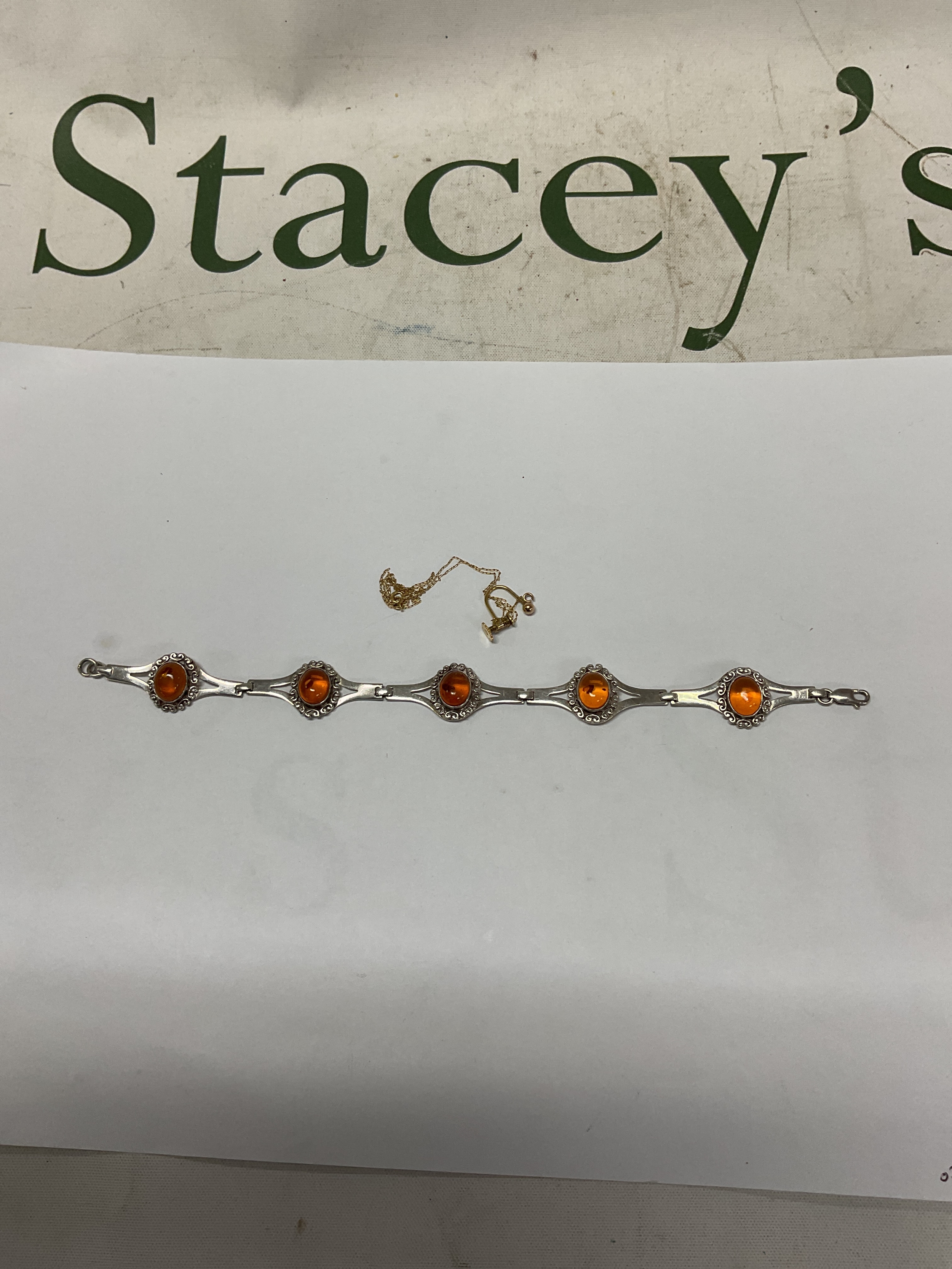 9 ct trace chain, earring and silver amber set bracelet.