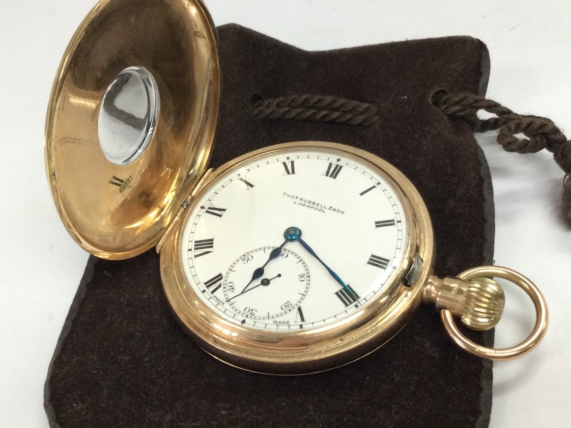 A 9ct gold Thomas Russel 1/2 hunter pocket watch, seen working