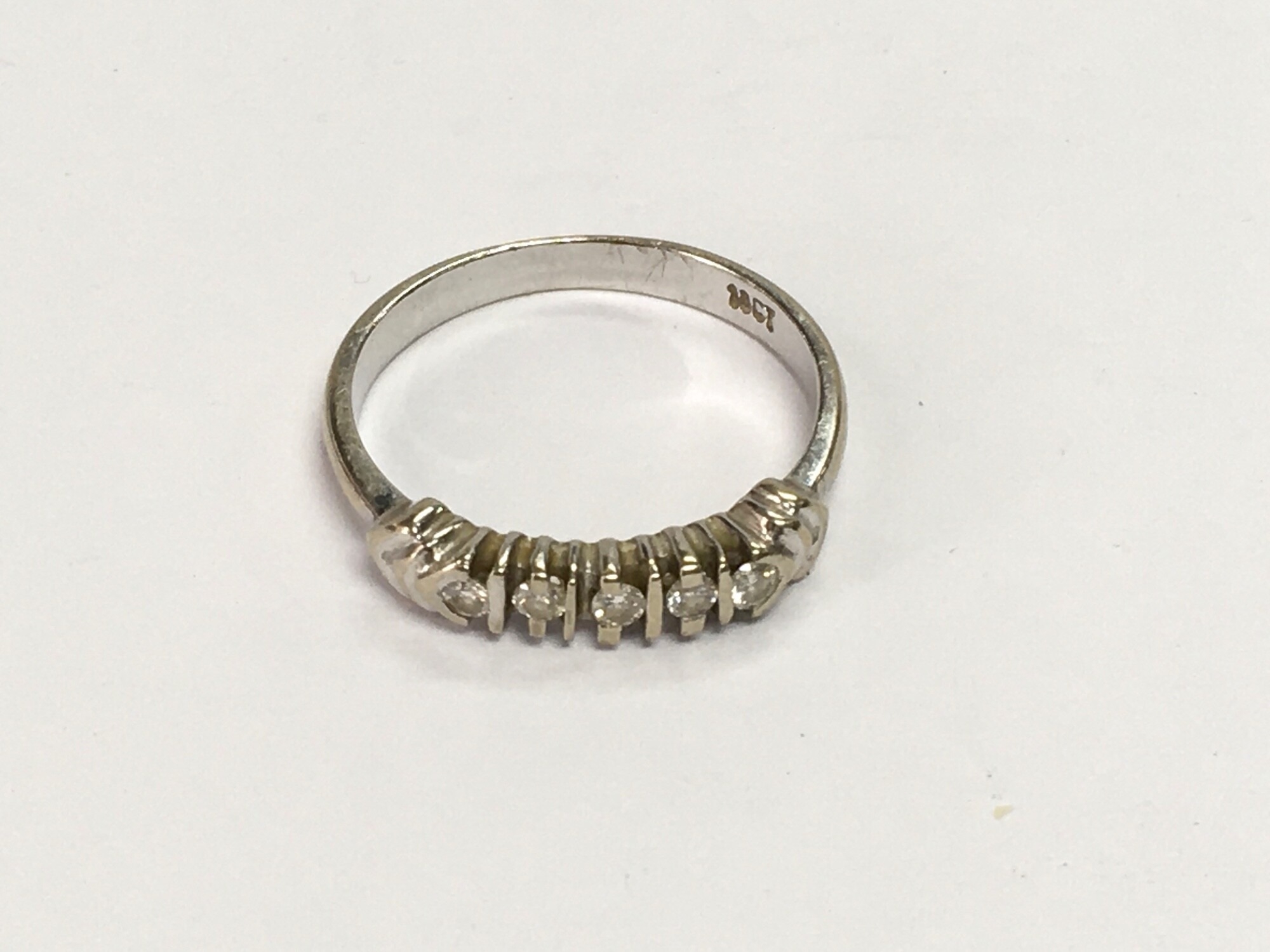 An 18ct white gold ring set with small diamonds, approx 2.3g and approx size M-N.