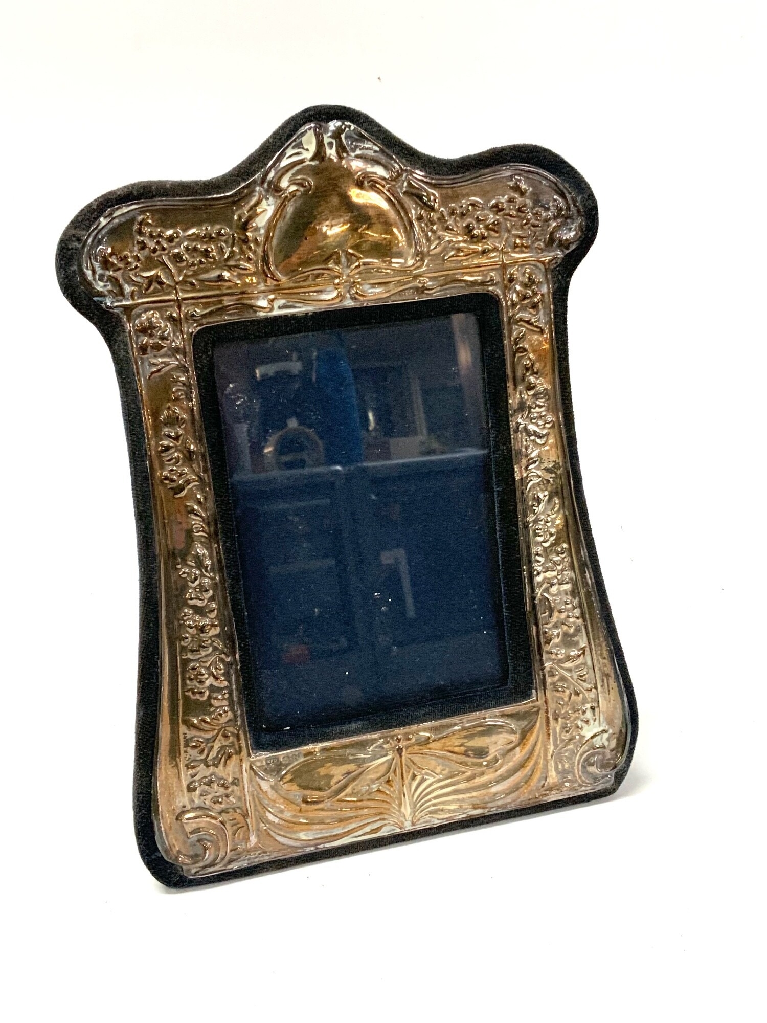 A modern hallmarked silver photo frame in an art Noveau design. 23cm. NO RESERVE