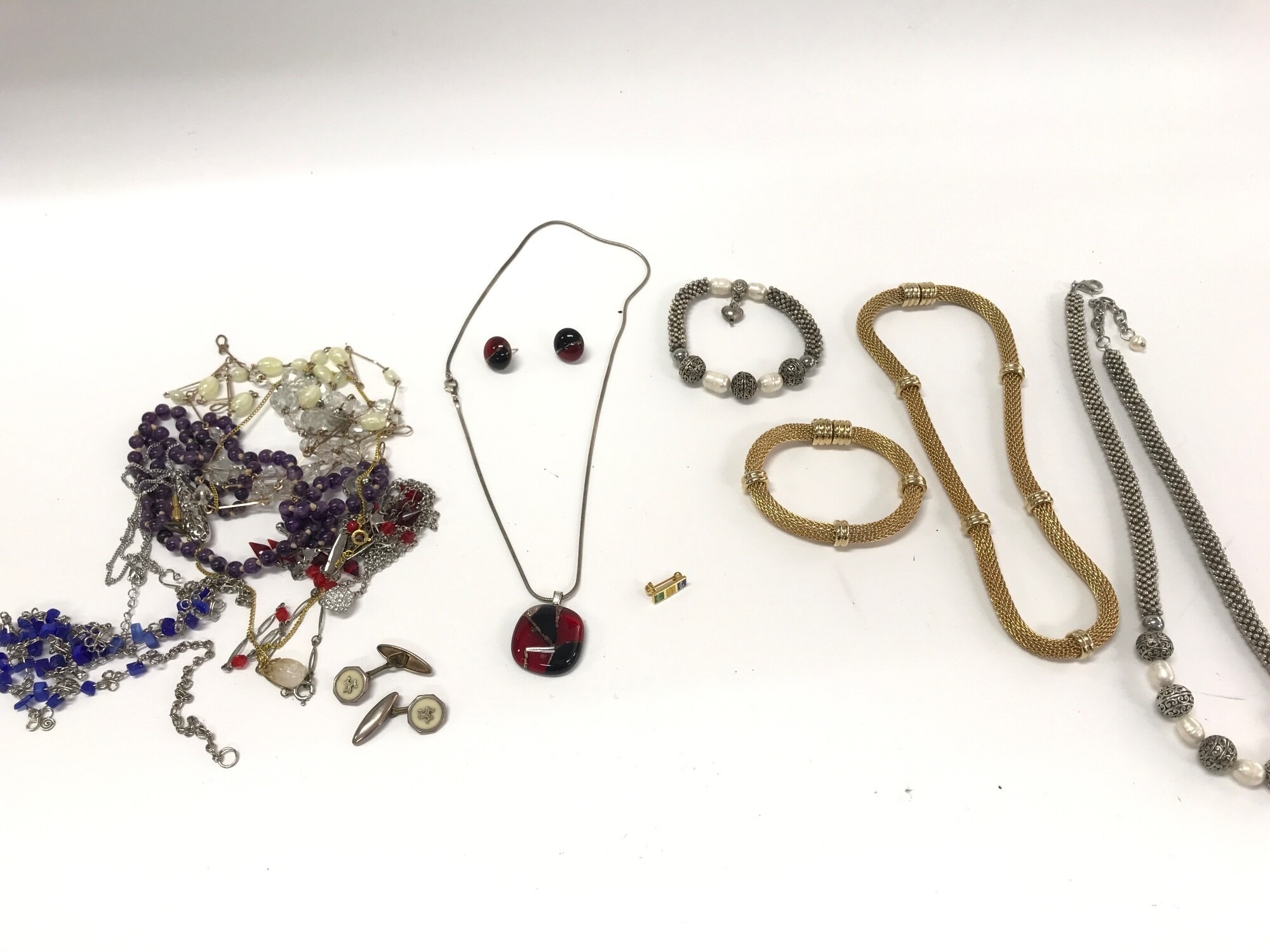 A collection of assorted costume jewellery including some Murano glass.