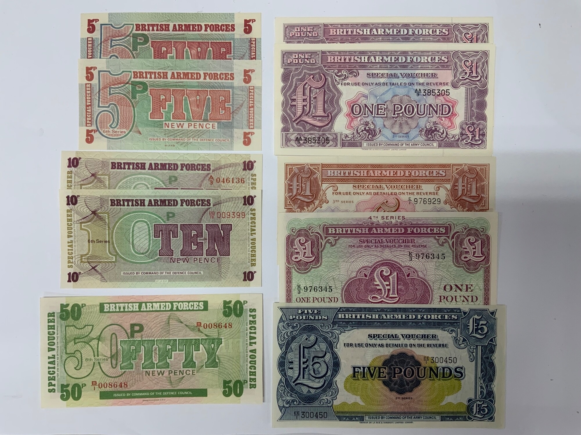A collection of BAF (British Armed Forces) £1 notes x 5 various designs / £5 Pound note. Also 5 BAF Special vouchers x2 5p, x2 10p, x1 50p. NO RESERVE
