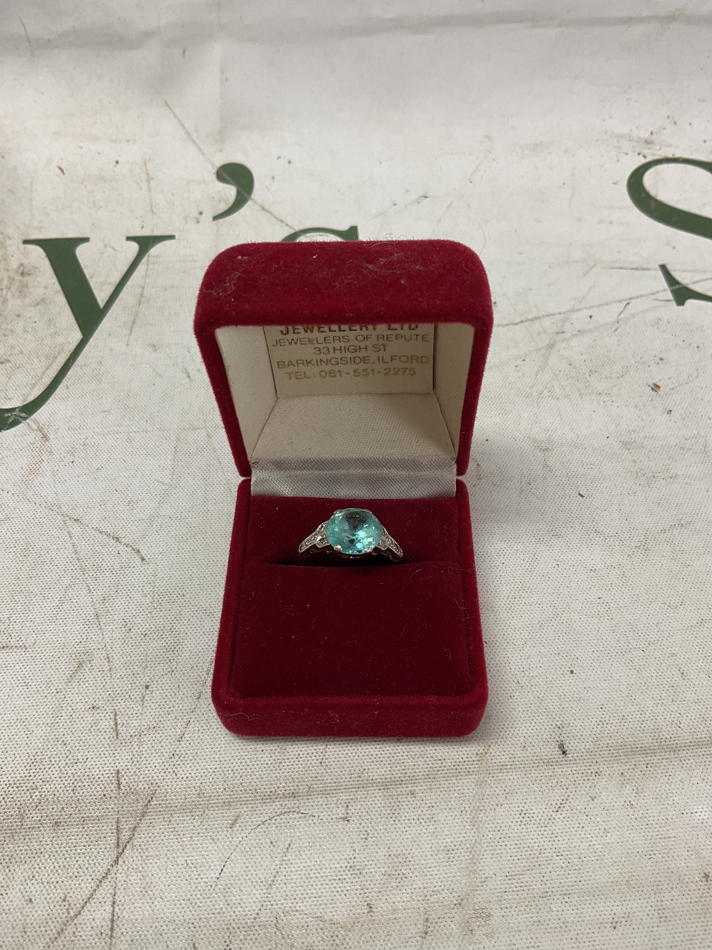 Art Deco 18ct and Platinum diamond set ring with central blue Zircon stone. 