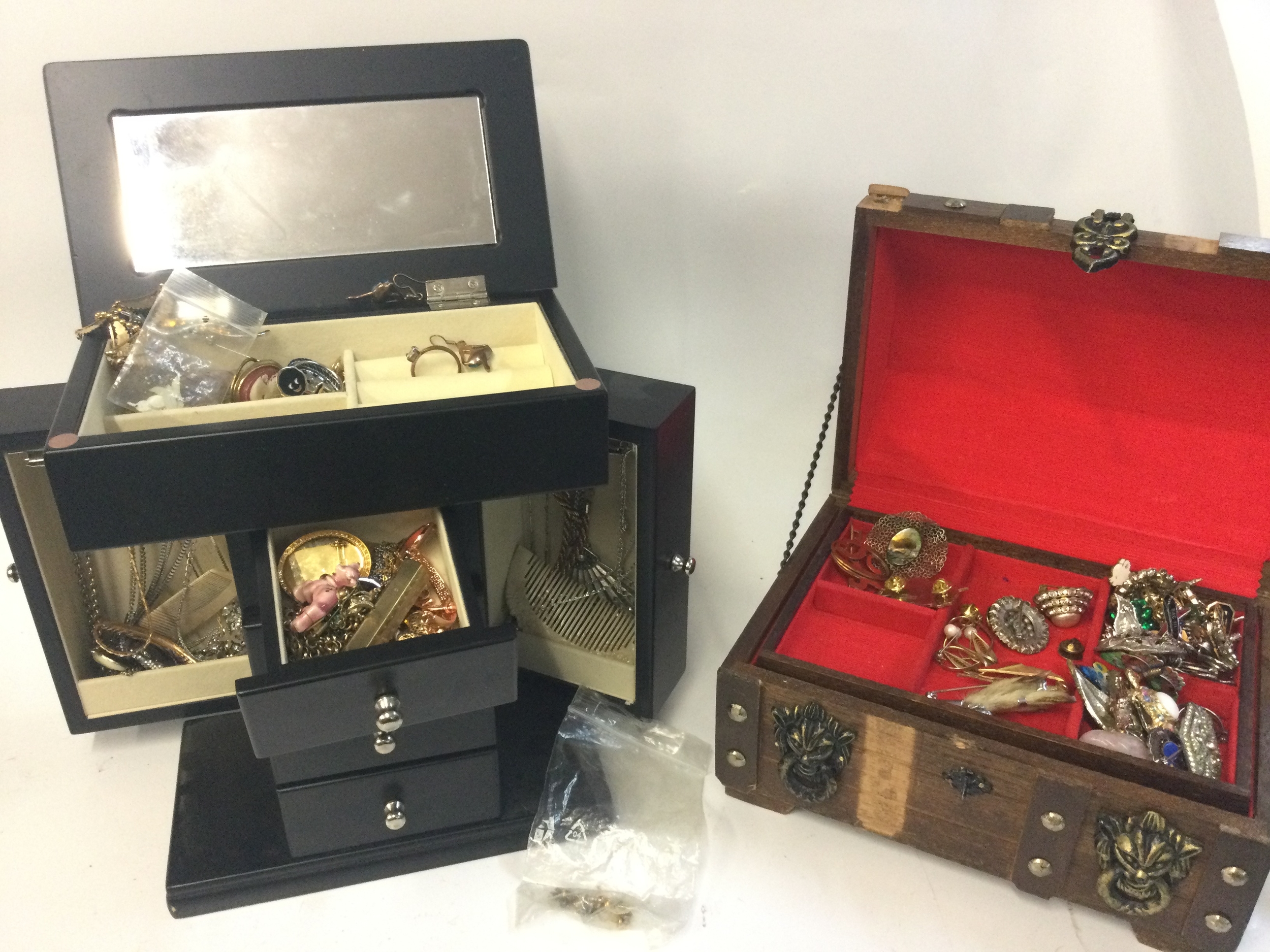 A collection of costume Jewellery including brooches, pins, necklaces etc