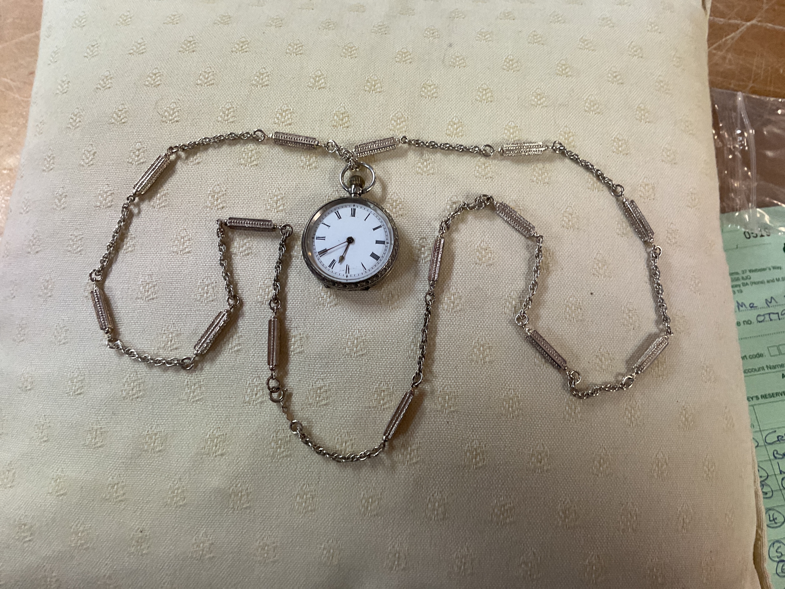 Ladies 935 silver watch on heavy silver longguard chain. Weighing 38 grams.