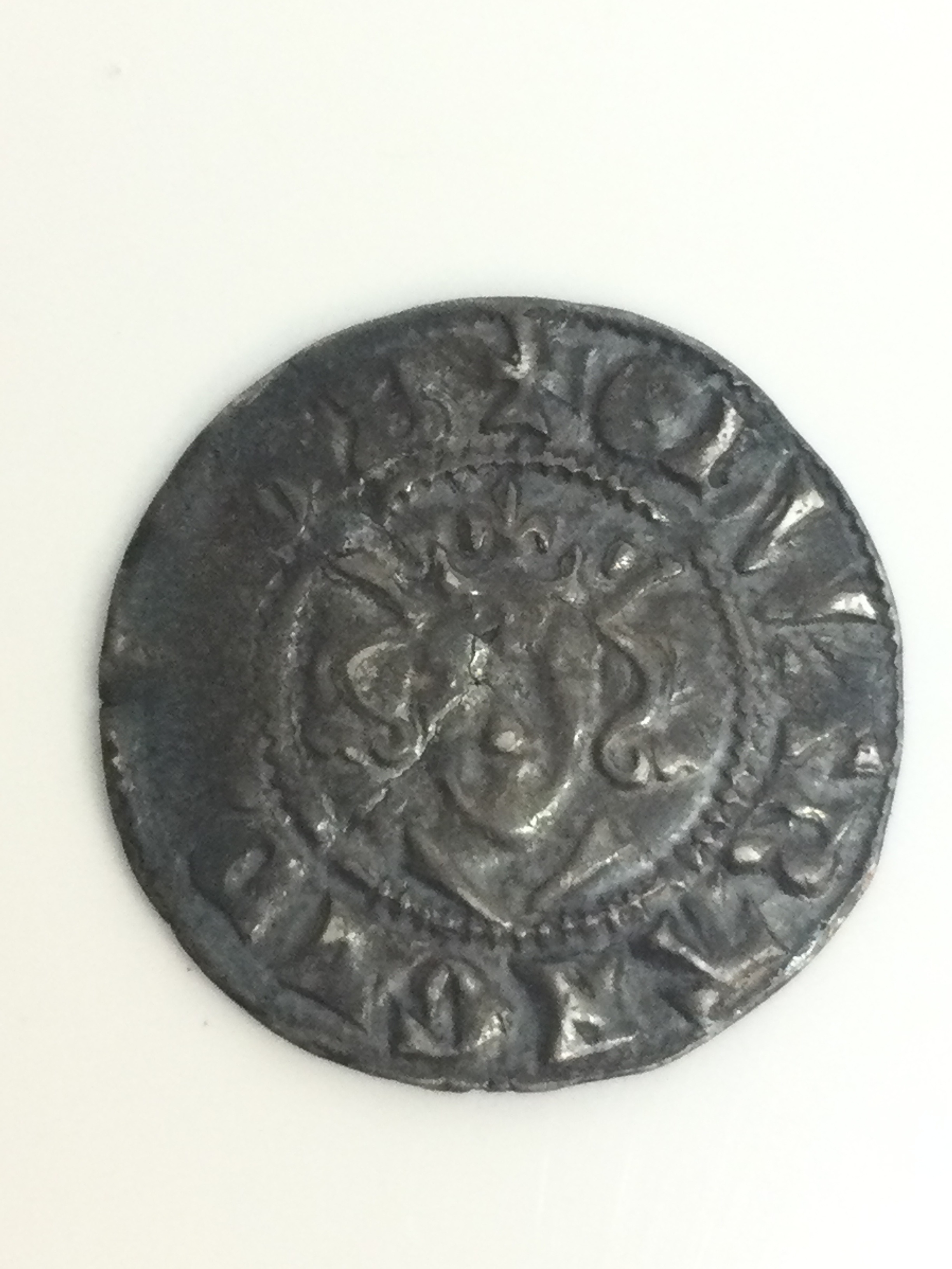A Medieval English silver penny minted during the reign of King Edward I (1272-1307)/ Edward II (1307-1327)