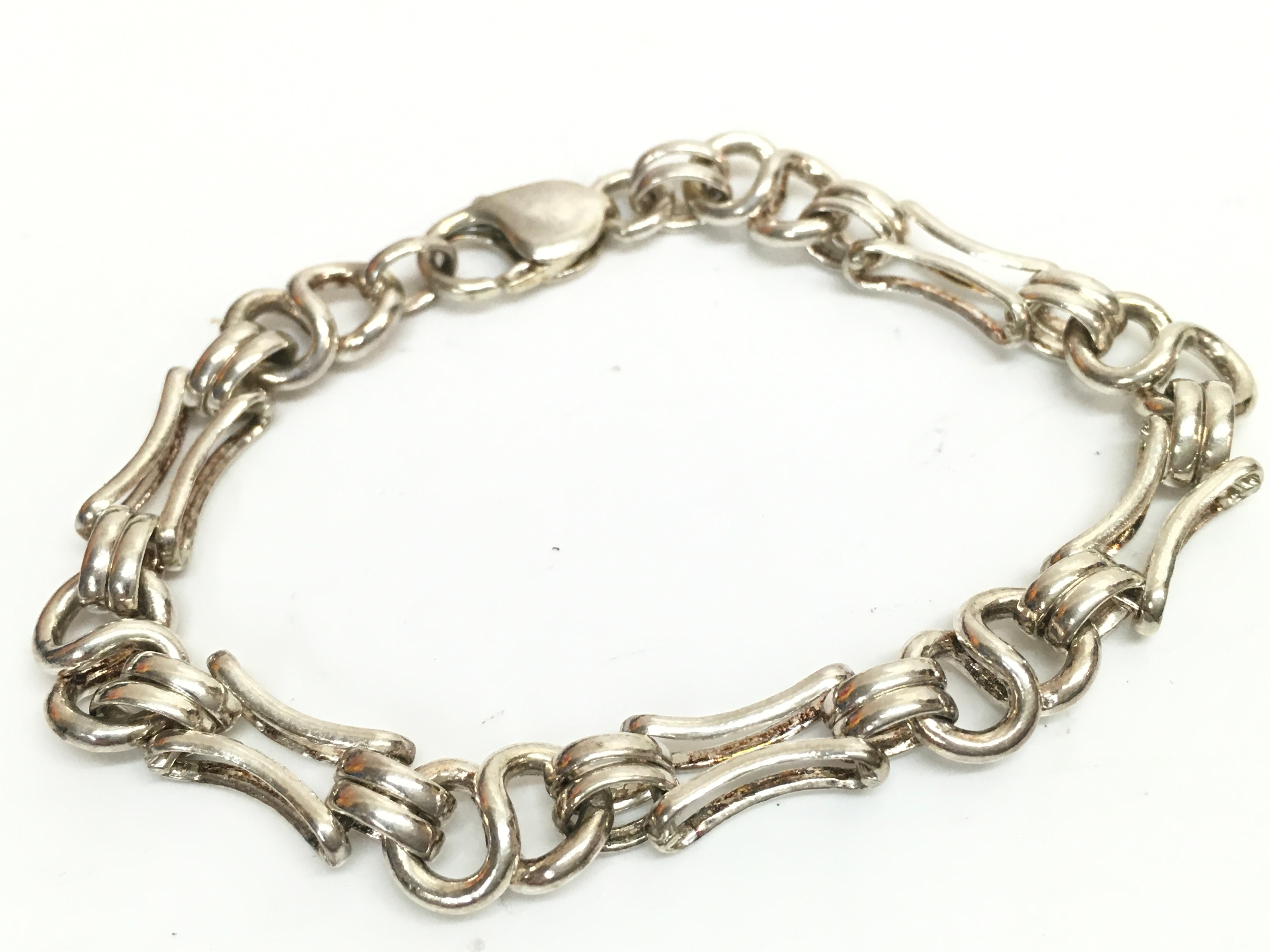 A silver bracelet , 20g total weight 