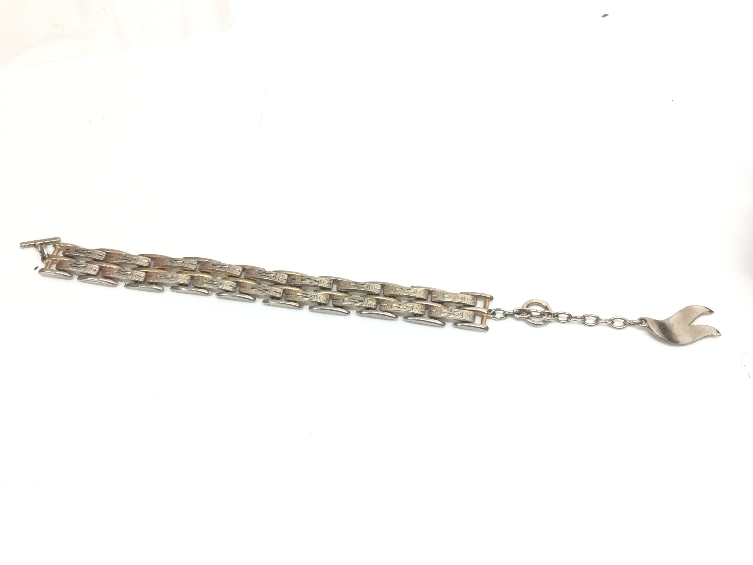 An Edwardian silver plate gilt decorated bracelet , 15cm wide