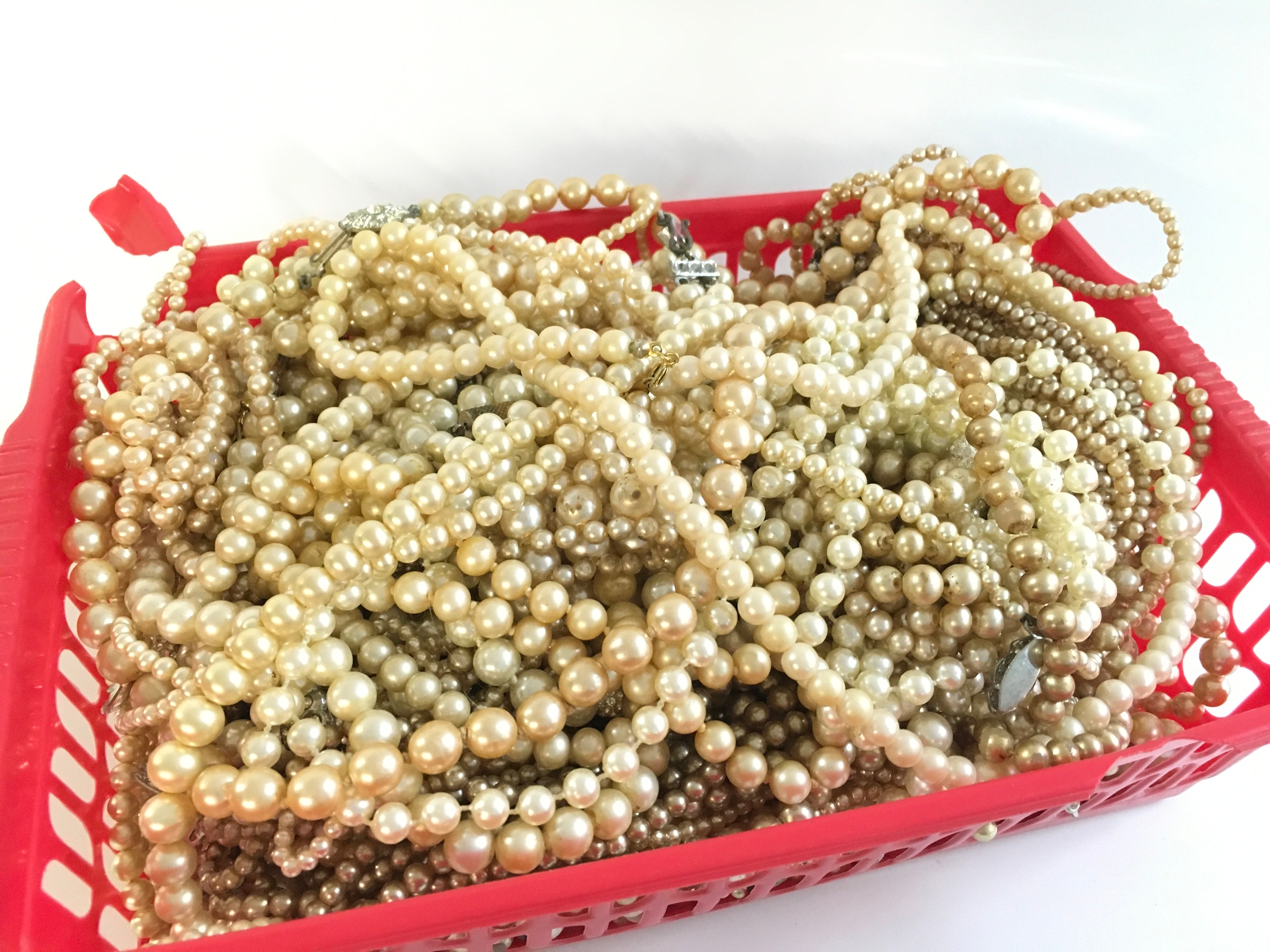 A collection of simulated pearl necklaces