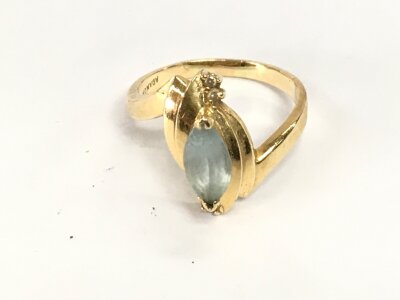 A 14ct gold stone set ring. Size P and 4.29g