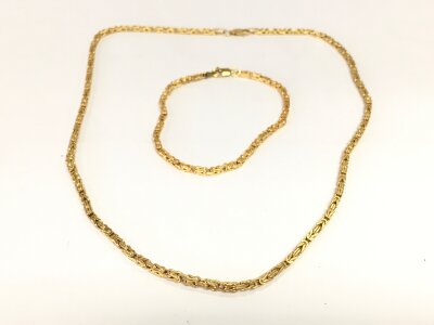 A 9ct gold closed link bracelet and matching chain. 9.77g