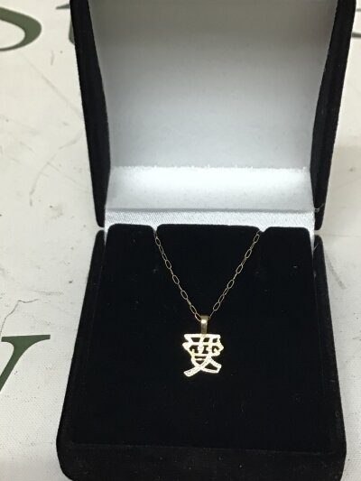A 9carat gold necklace with a Chinese influence pendent NO RESERVE