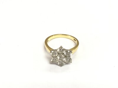 An 18ct gold diamond cluster ring, approx 5.5g and approx size O-P.