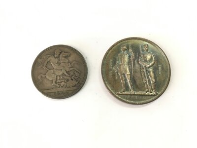 An 1892 crown and a 1880 commemorative medallion.