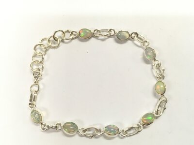 Silver link bracelet set with Ethiopian opals. Approximately 7ct opals.