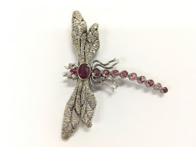 Silver dragonfly brooch/pendant set with oval and round pink tourmalines rubies and diamonds. Approximately 2.48ct tourmaline 0.10ct rubies and 1.77ct diamonds.