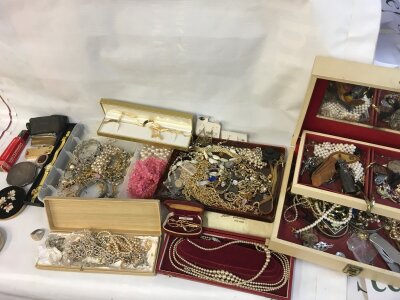 A large collection of assorted costume jewellery including many silver items and some gold.