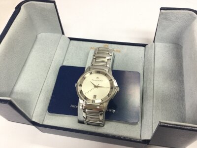 A boxed Maurice Lacroix watch