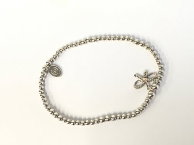A Clogau silver and gold bracelet with box and pouch.