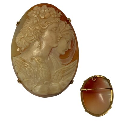 A 1970s gold mounted carved shell cameo brooch, 5cm x 3.5cm, (tested Min 14ct).