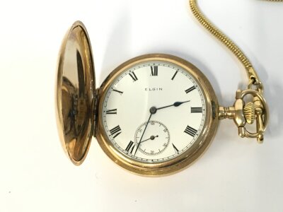 An Elgin button wind pocket watch. 50mm case winds and runs