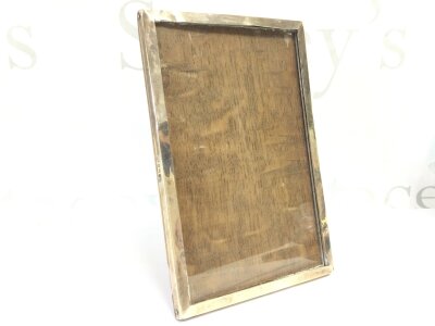 A hallmarked silver frame, 19.5Cm highs 12.7cm wide, Robert Pringle and sons Birmingham 1930s