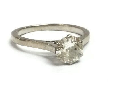 An 18ct white gold solitaire ring, size O, 3.6g
