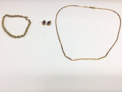 9ct gold chain and bracelet and an9ct pair of stone set earrings.
7.85g