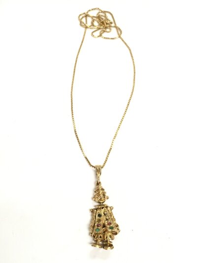 A 9ct clown pendant and a 14k chain, 8.9g total weight