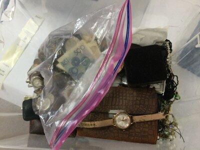 A large collection of costume jewellery and odds coins and bank notes