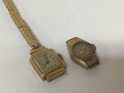 An 18 carat gold cased Vintage ladies watch with a later chrome and gold plated strap and one other gold cased watch (2)