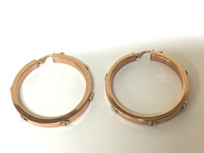 A Pair of Cartier style earrings. 9carat rose gold. Weight 5g