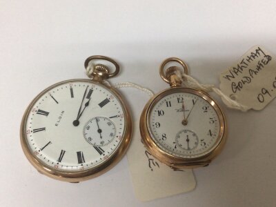 A gold plated button wind Elgin pocket watch seen working and a small Waltham gold plated pocket watch (2)