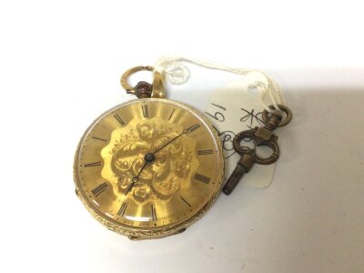 A Gold cased yellow metal unmarked  key  wind pocket watch with an elaborate case and dial not seen working.