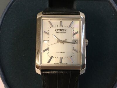 A Gents Citizen eco drive sapphire watch with box and manual. Seen running