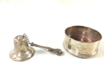 A silver coaster and a silver bell, 190g