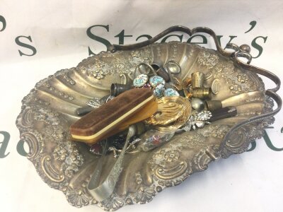 A collection of costume jewellery and enamel buttons, silver plated tray