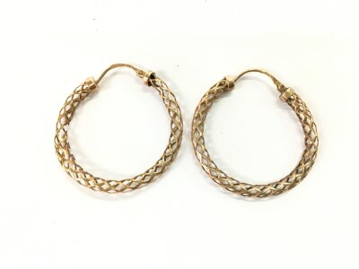 A pair of 9ct gold earrings. 2.36g note some damage.