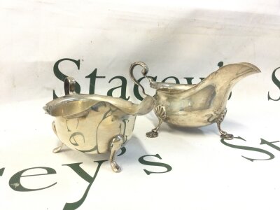 Two silver hallmarked gravy boats , 250g total weight