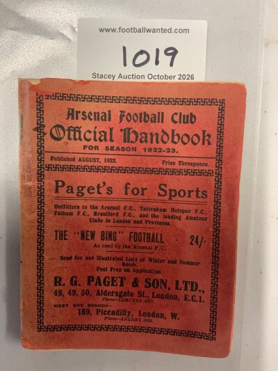 1922 - 1923 Arsenal Football Handbook: Fair condition with staple failing leaving centre page loose and cover detached. Bleeding from colourful cover to inner page.