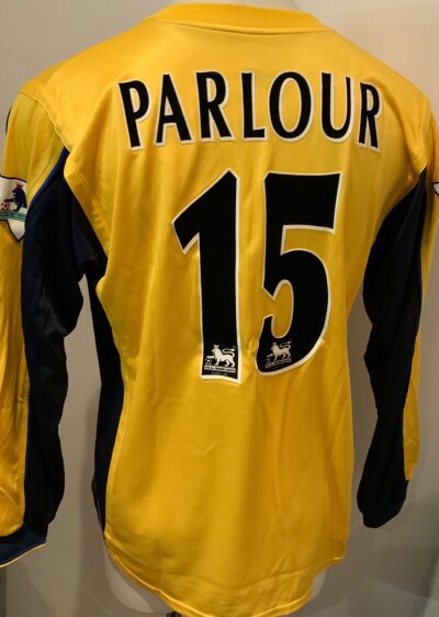 Arsenal Parlour Match Worn Football Shirt: Yellow away long sleeve Nike Sega number 15 shirt with Parlour to rear. Premier League badging to both sleeves. Worn by Parlour v Middlesbrough on 4 11 2000.. COA signed by player.